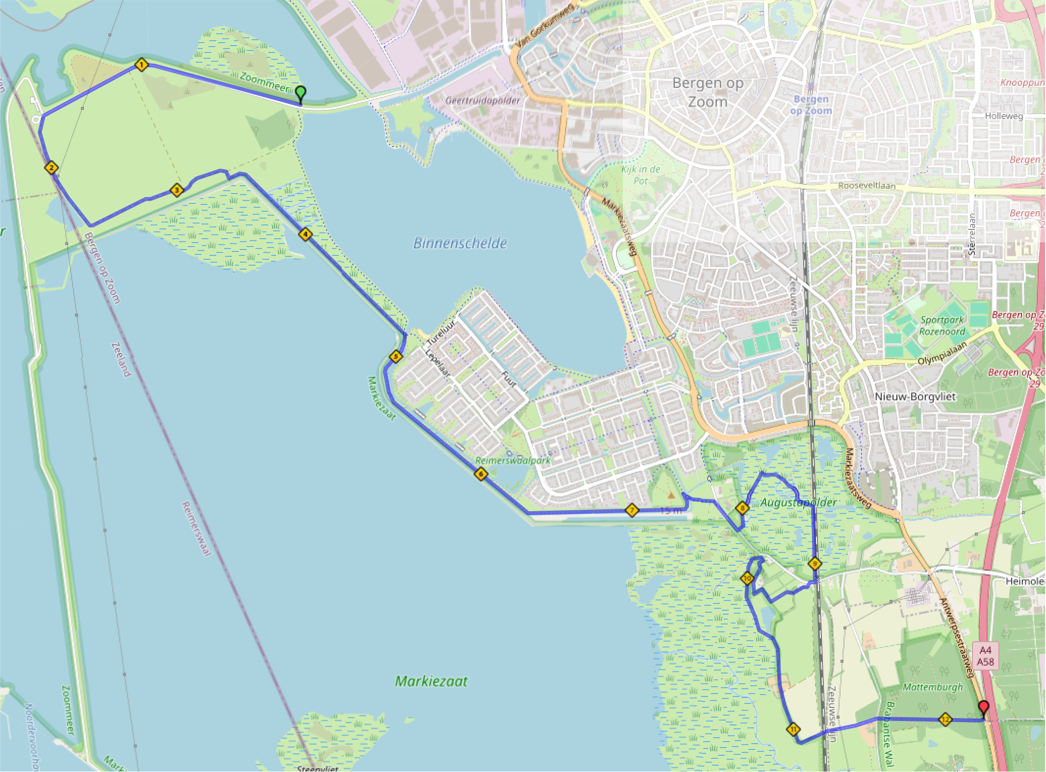 A map displays a planned route through and around a city and waterbody, with landmarks and roads marked.